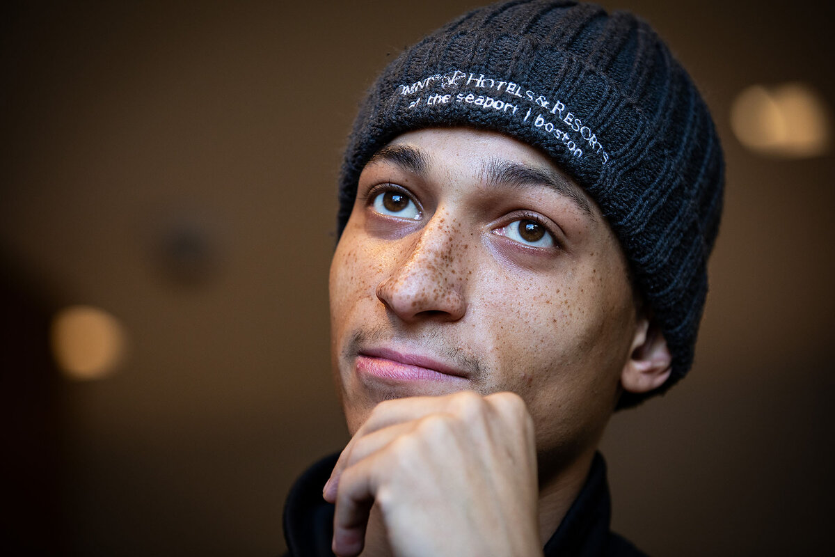 A close-up photo of William Brown, wearing a dark knit cap and touching his chin with his hand in a thoughtful pose. Mr. Brown has struggled to keep up with the lasting effects of inflation. 