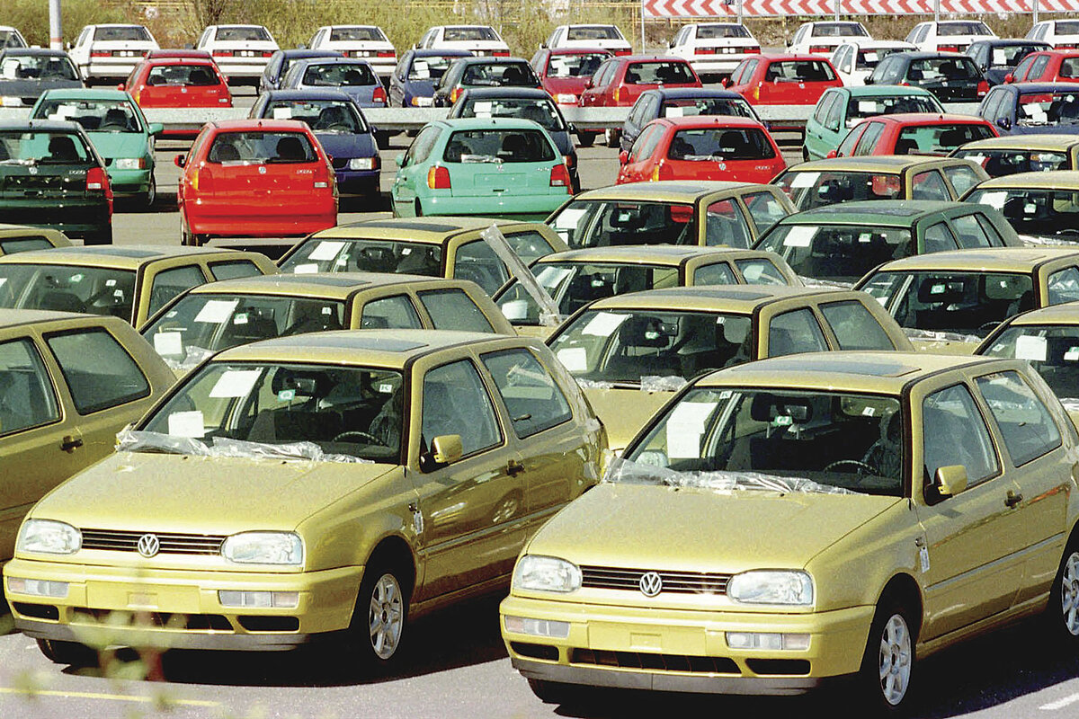 Rows of 1997 Volkswagen Golfs sit in a parking lot in Wolfsburg, Germany.