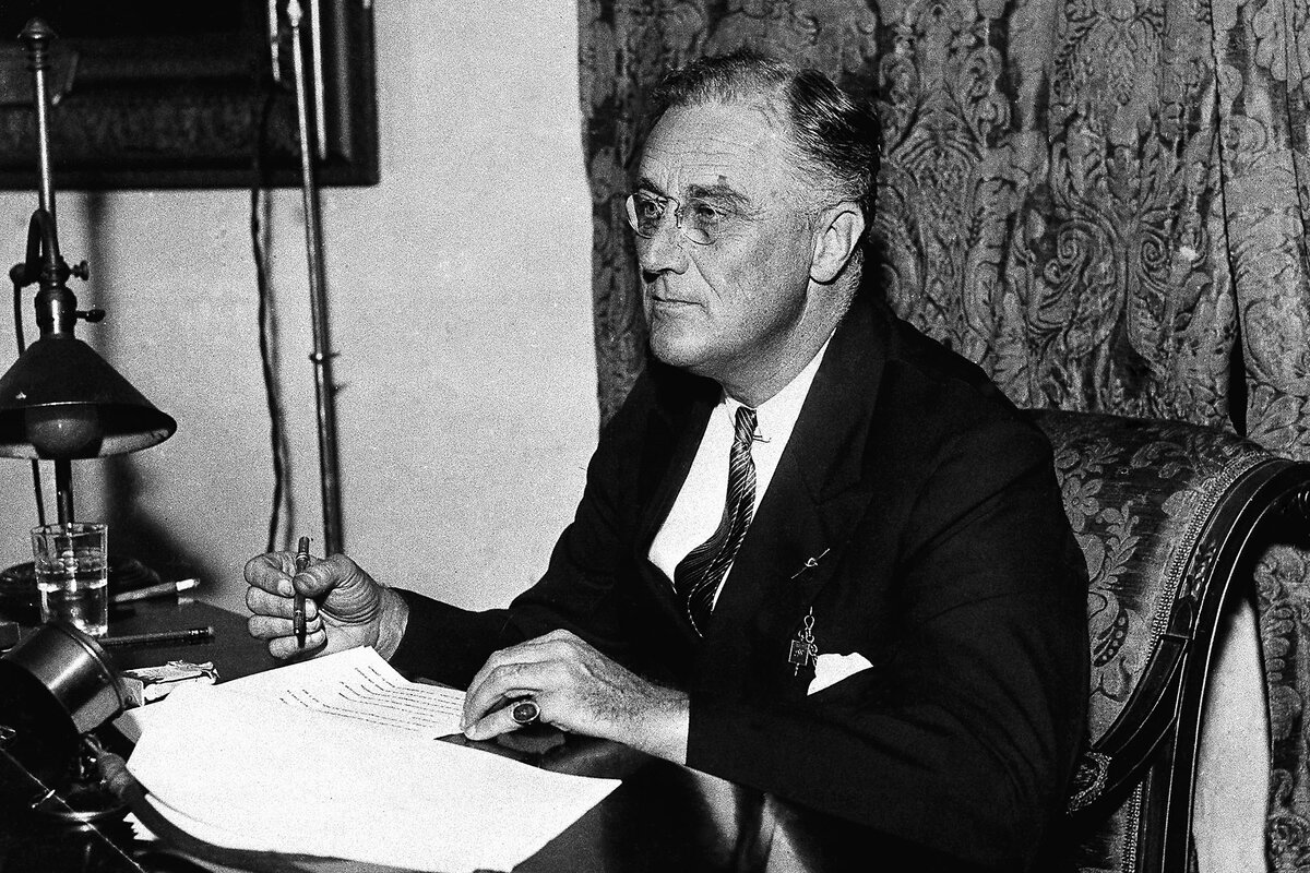 President Franklin D. Roosevelt is seated at his desk in the White House in Washington, as he spoke by radio to the nation, Oct. 22, 1933. Roosevelt signed hundreds of executive orders as he sought to advance his agenda.