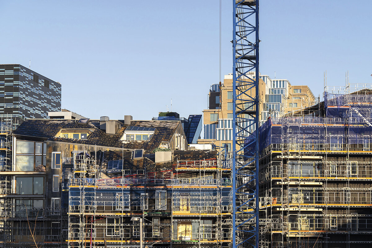 Scaffolding is erected on residential and commercial buildings in Oslo, Norway, Feb. 1, 2025.
