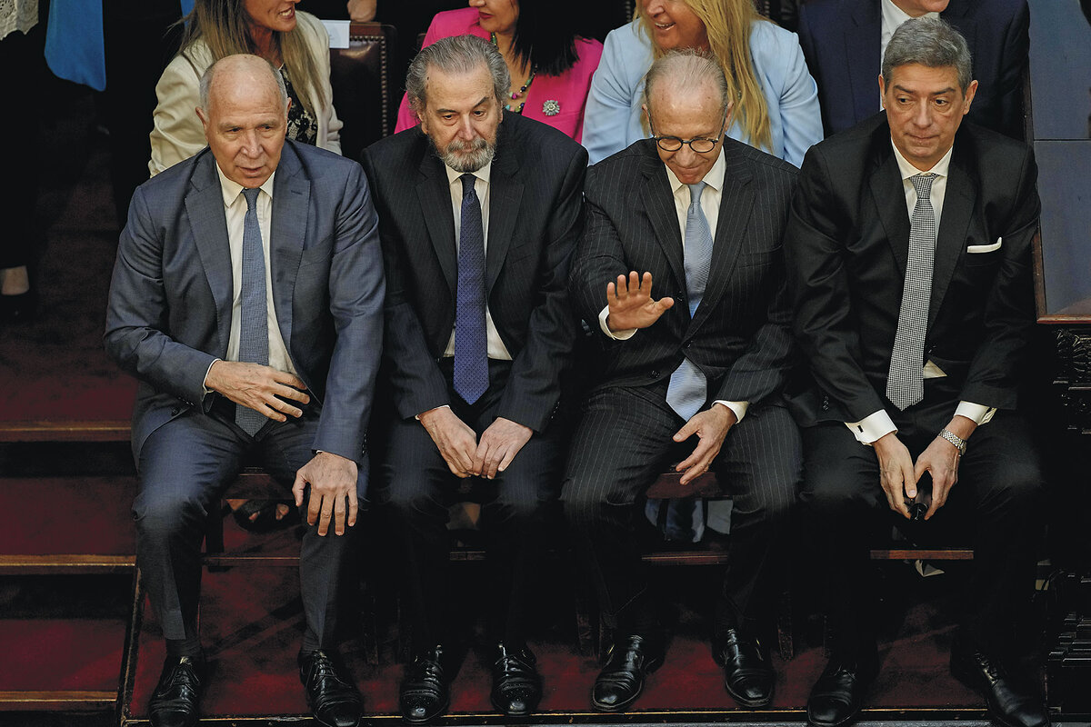 Four Argentine Supreme Court justices in suits and ties are seated together at a legislative session in Buenos Aires.