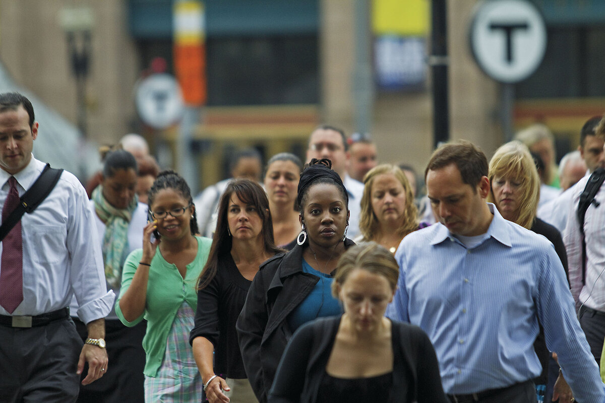 Commuters walk to work near Boston鈥檚 South Station.