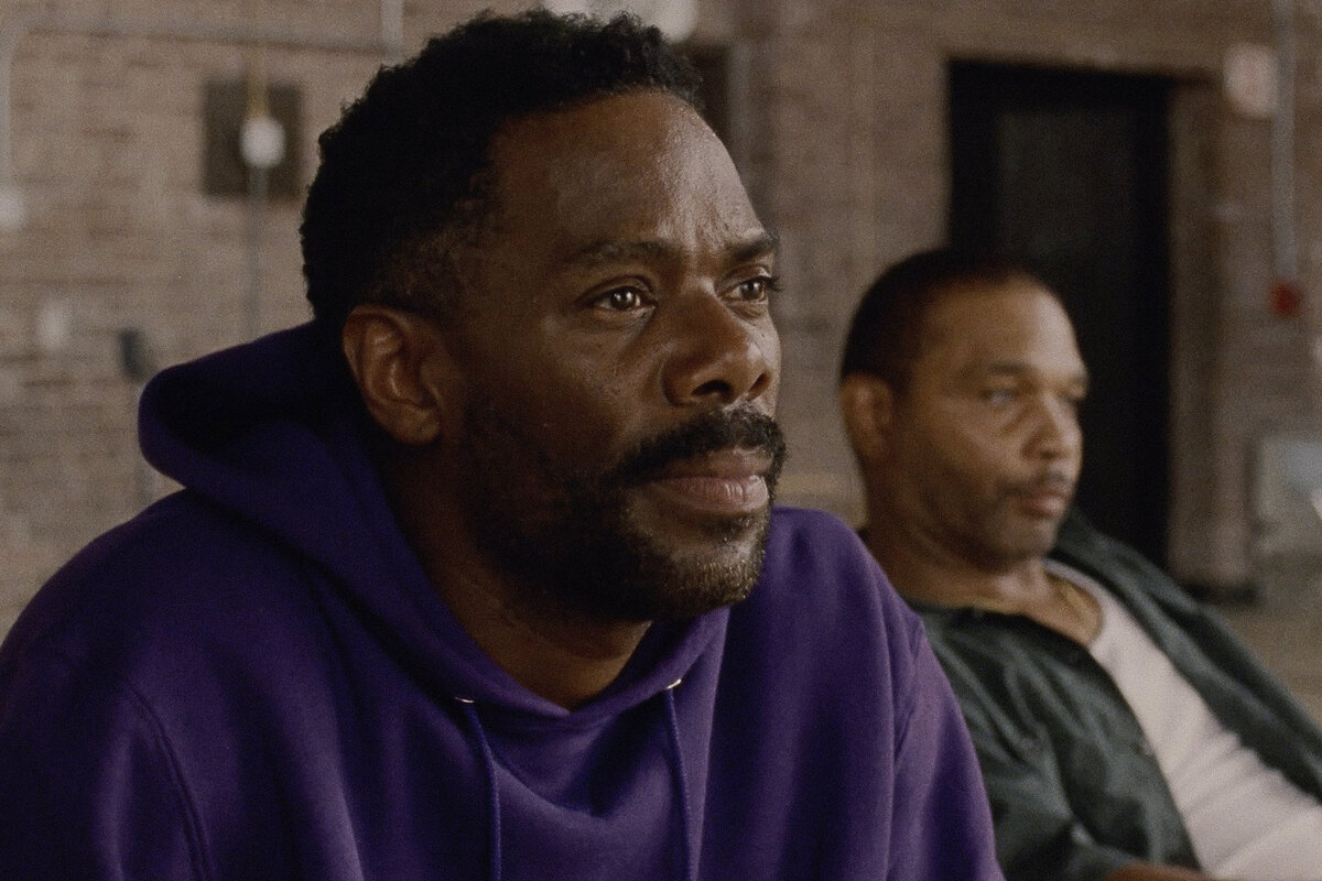 Colman Domingo, a best actor nominee, and Clarence Maclin sit together and look away from the camera