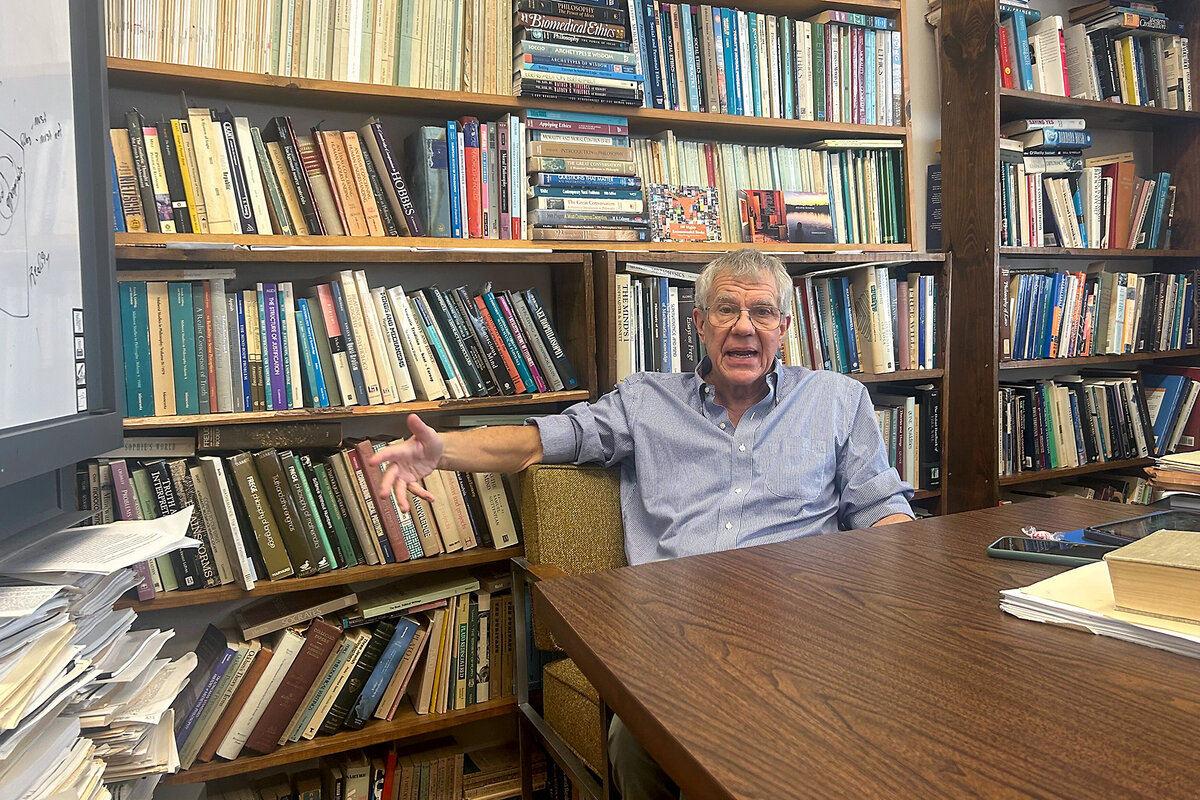 Professor Daniel Bonevac looks at the camera while talking in his office at the University of Texas at Austin