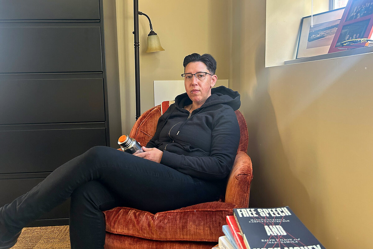 Professor Karma Chávez sits in her office at the University of Texas at Austin looking at the camera