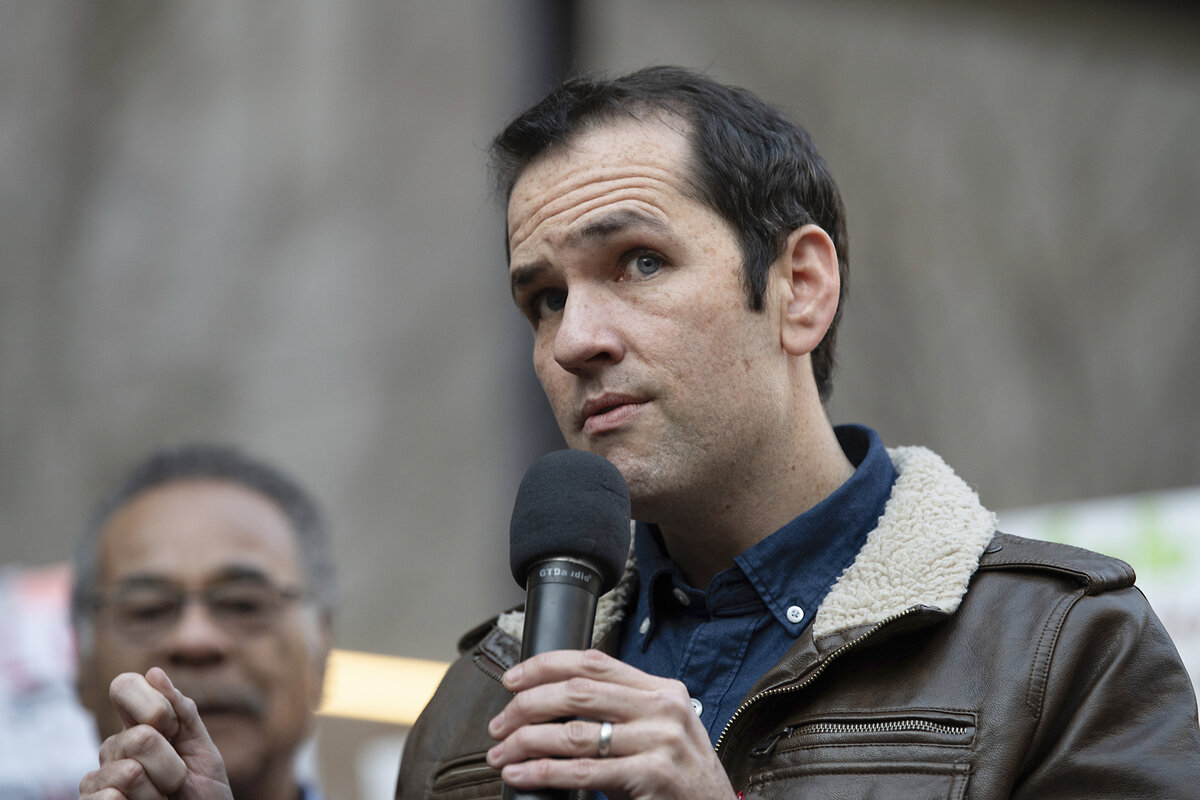 Ezra Levin participates in a rally outside the Consumer Financial Protection Bureau headquarters, protesting its closure by the Office of Management and Budget at a rally organized by workers in Washington on February 10, 2025. 