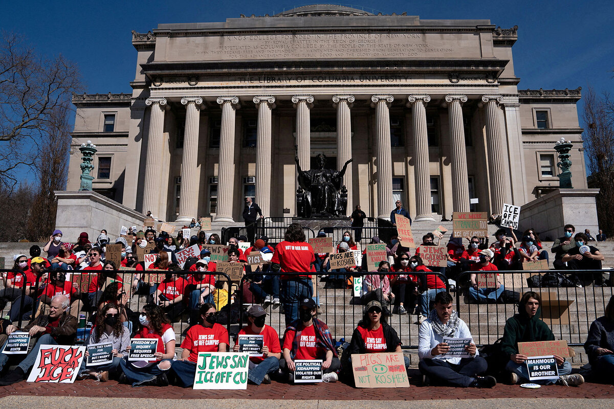 Students staging a protest at Columbia University in New York sit on the steps of Low Library on campus 