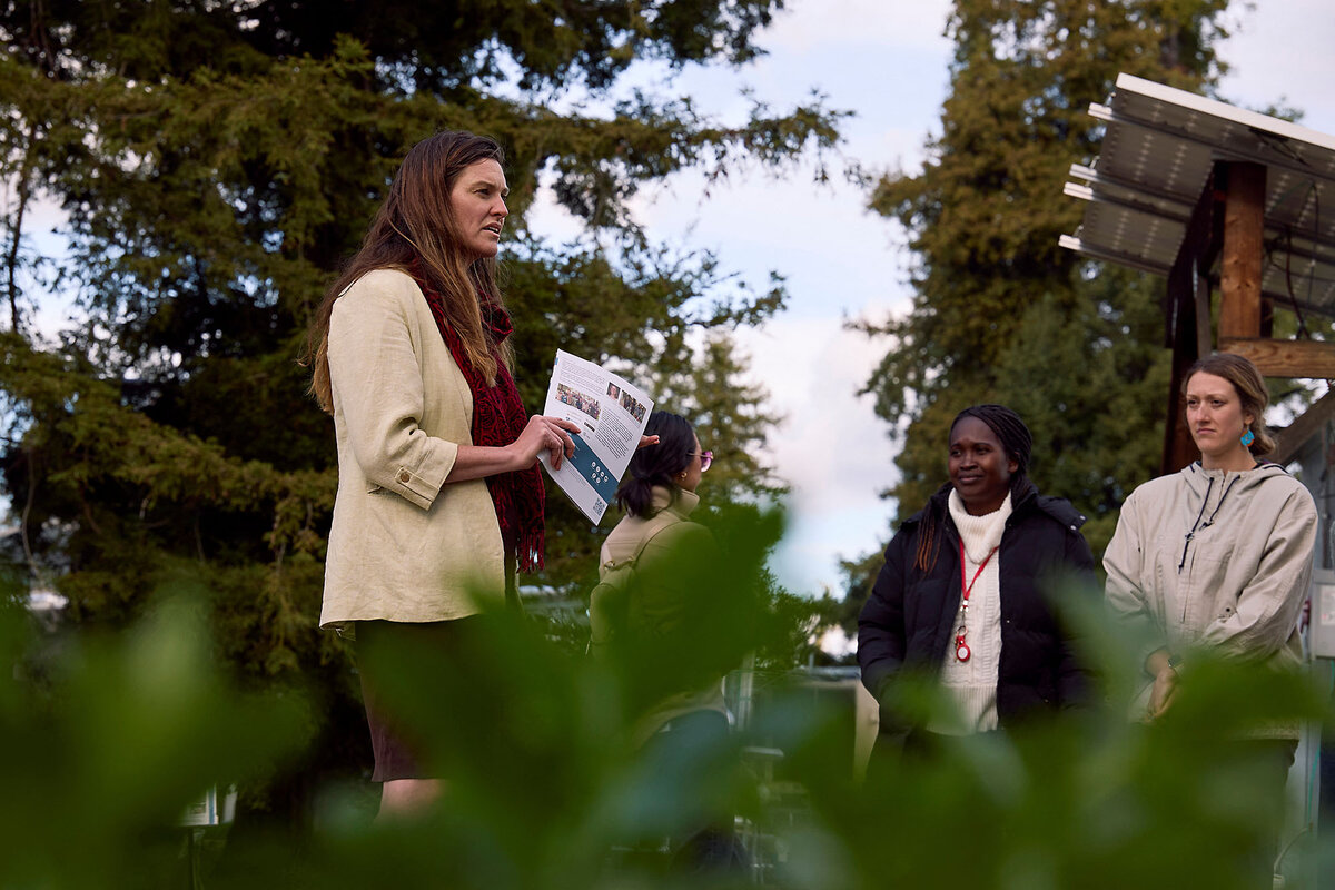 Erin McGuire, director of the Feed the Future Innovation Lab for Horticulture, speaks outside to a group in Davis, California