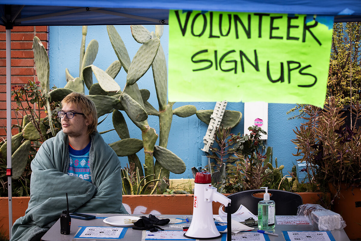 Iris Spear volunteers at the Pasadena Community Job Center coordinating the sign-up for more volunteers to help wildfire survivors with donations of food, clothing, and household goods, on February 12, 2025 in Pasadena, California. 