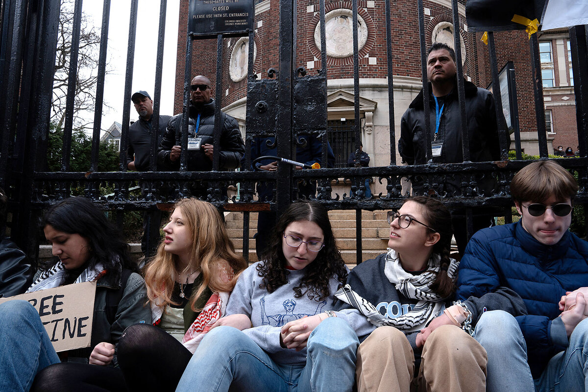 Students link arms to protest against the arrest of Mahmoud Khalil in New York. 