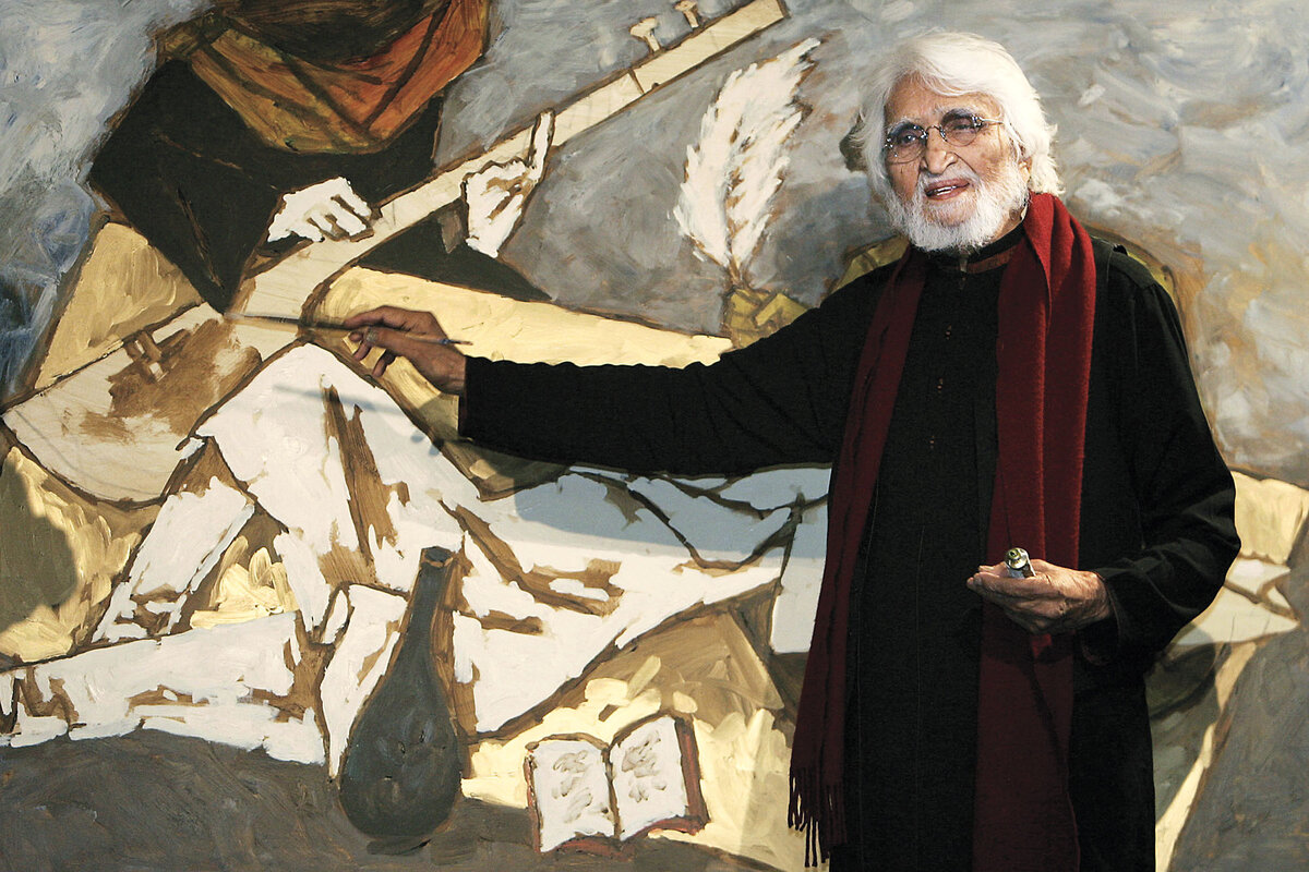 Maqbool Fida Husain, India’s most famous artist, finishes a work he made with a Bollywood actor at a fundraiser in London, 2007.