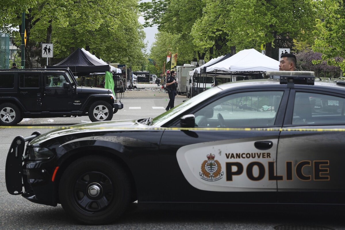 Vancouver Police survey the scene after a driver killed multiple people Saturday during a Filipino community festival, April 27, 2025, in Vancouver, British Columbia.