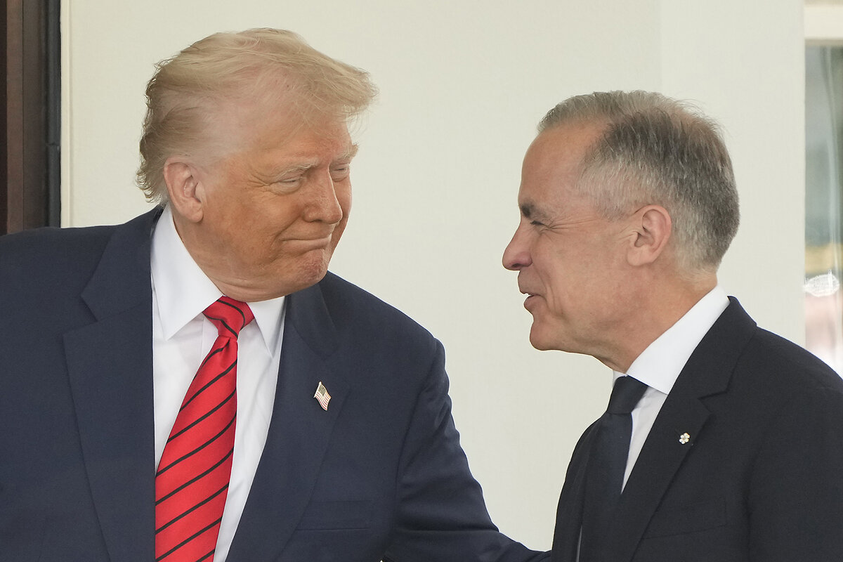 Canadian Prime Minister Mark Carney is greeted by President Donald Trump at the White House.