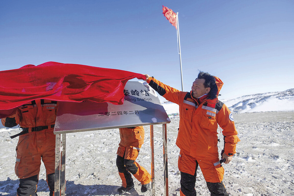 Scientists in Antarctica celebrate the launch of Qinling Station,China’s fifth research facility on the continent.