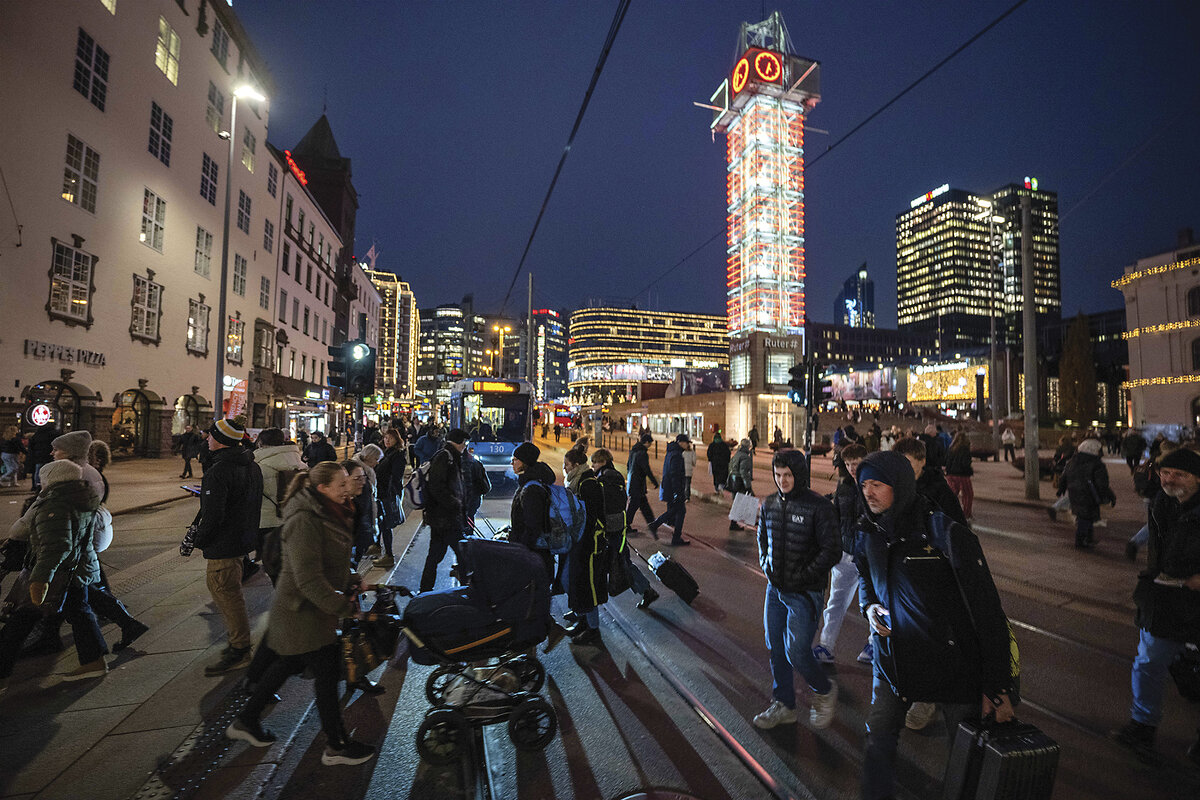 Evening strollers fill a street in Oslo, Norway. Oslo has fewer unhoused people compared with many European capitals.