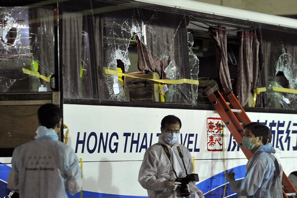 Hong Kong Police Inspect Philippines Bus Where Hong Kong Hostages Killed 6159