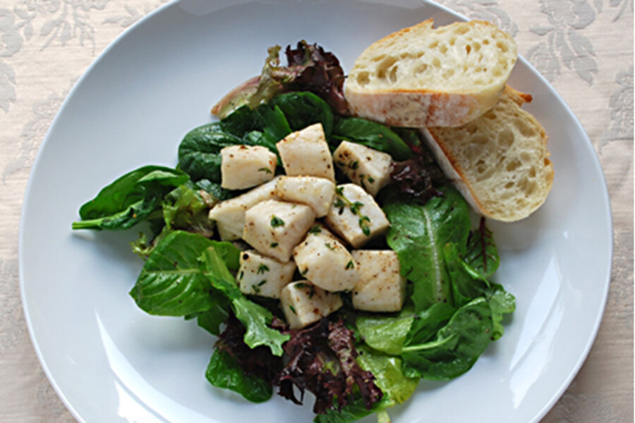 Butter poached tilapia with thyme and mixed greens