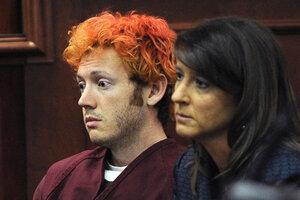 Shooting suspect James Holmes described killings in package