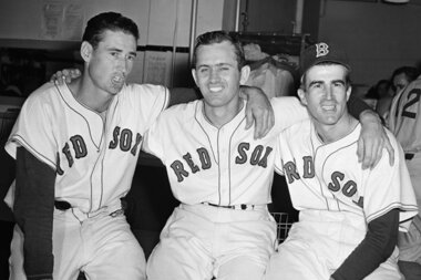 Boston, MA - Red Sox players all wearing Johnny Pesky's jersey in