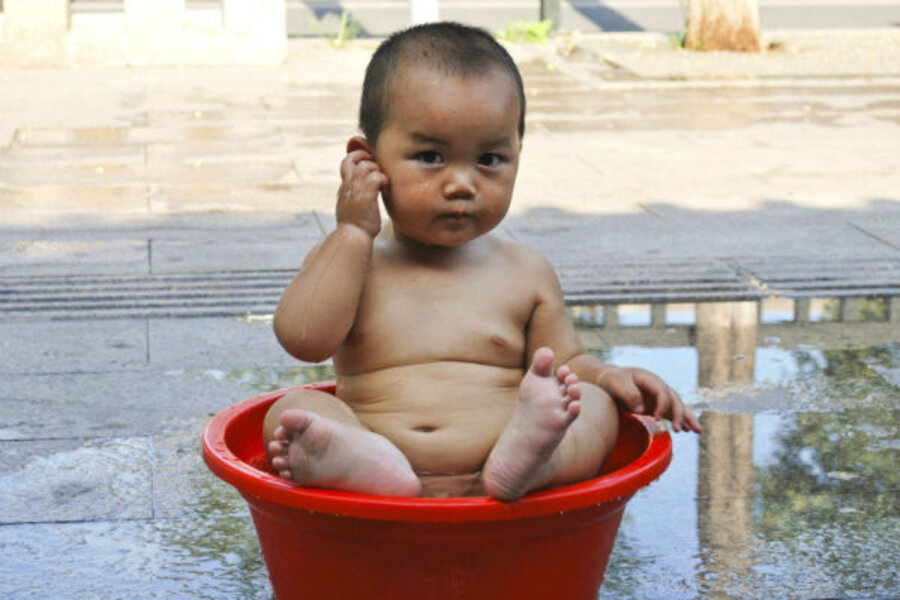 Potty training Chinese style: With a diaper-free child, look for potted plants