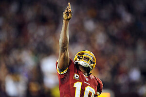 Redskins coach: RG3 needs to improve in pocket