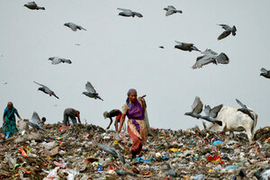 EDITORIAL USE ONLY An artwork of a female Indian waste picker by