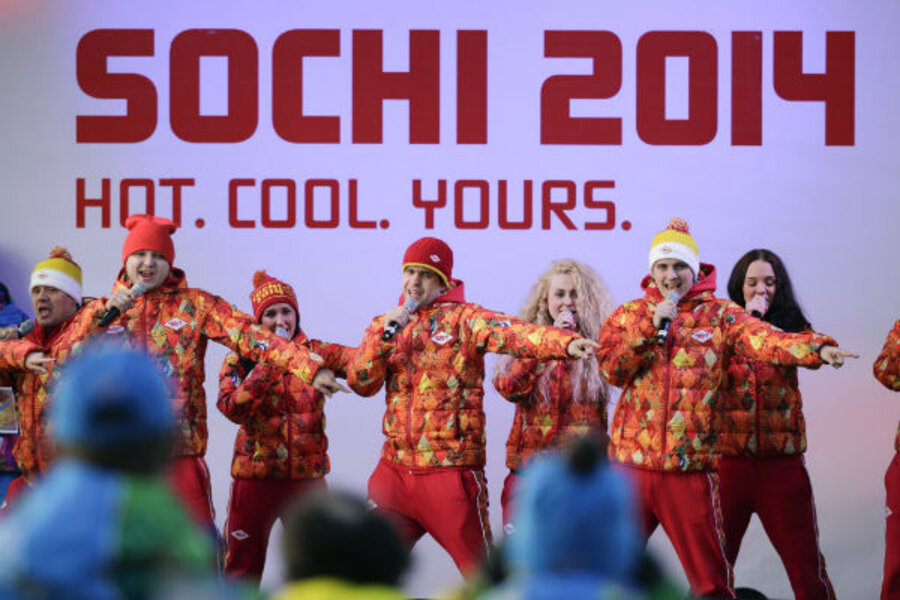 Sochi, Russia. 12th February 2014. A Spectator wears a drinking