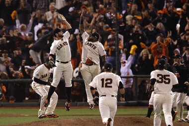 San Francisco Giants celebrate in the locker room after winning the  National League Championship Series against the St. Louis Cardinals in game  5 of the National League Championship at AT&T Park in