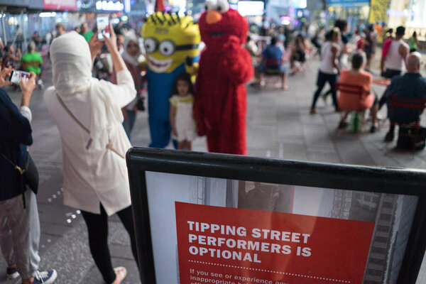 Times Square businesses propose zoning costumed pests