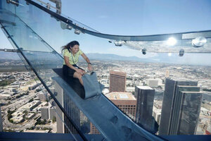 Hoping to lure tourists Los Angeles skyscraper installs a slide