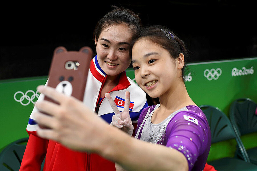 North and South Korean gymnasts' Olympic selfie captures 'great gesture' -  