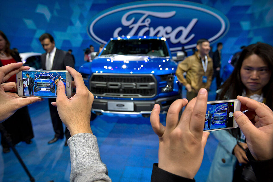 Quicker than expected, auto industry revs up for an electric-car future
