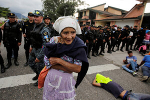 Fleeing violence Honduran migrant caravan enters Guatemala en