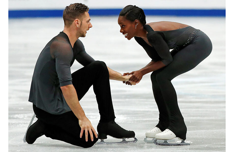 France's Vanessa James and Morgan Cipres react after their performance...