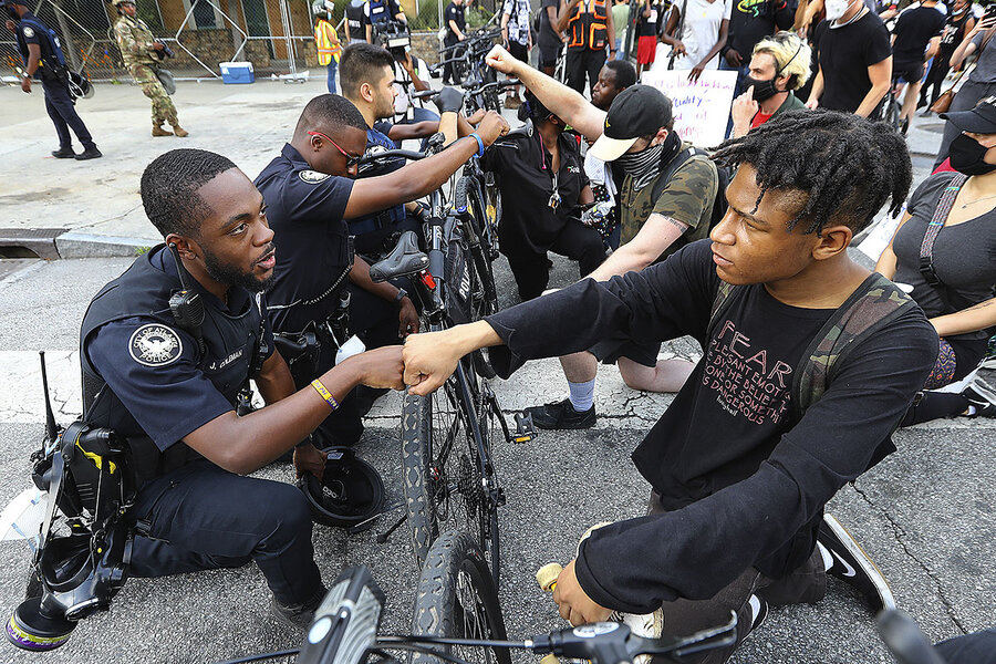 Floyd Protests The Promise And Limits Of Police Taking A Knee Csmonitor Com Floyd Protests The Promise And Limits Of Police Taking A Knee Csmonitor Com