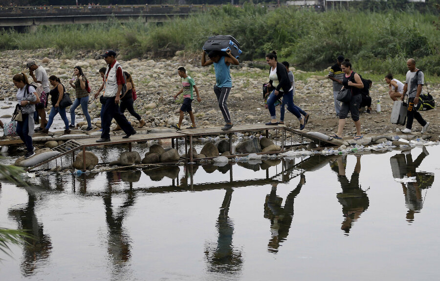 Colombia announces sweeping reforms to aid fleeing Venezuelans