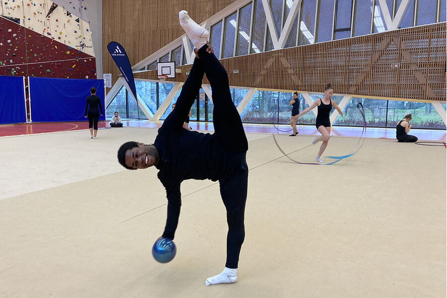 Flexible Professional Female Gymnasts Doing Rhythmic Gymnastics in