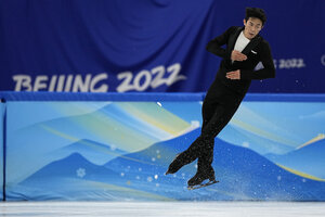 American Nathan Chen sets record in Olympics figure skating short