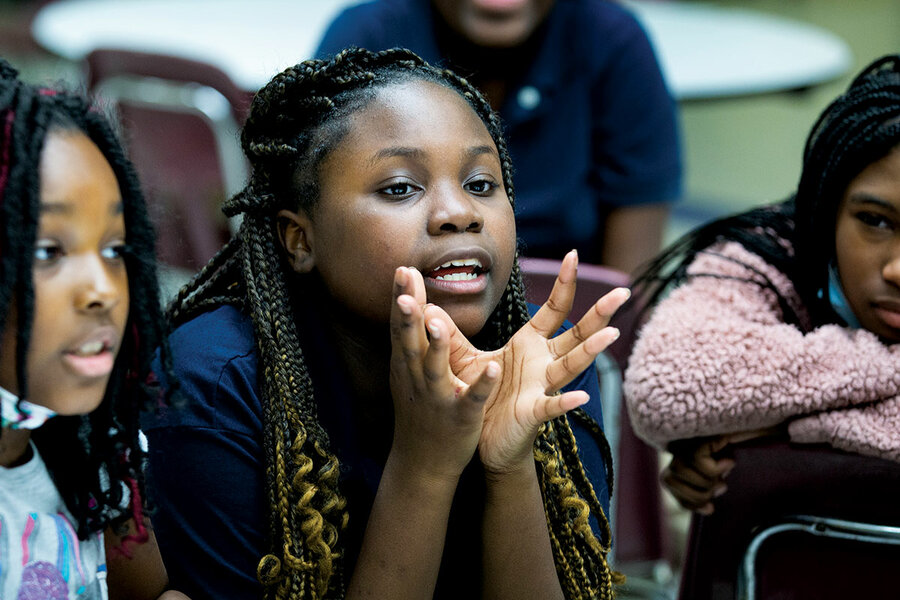 https://images.csmonitor.com/csm/2022/03/0411-CKIDS-girl-hands.jpg?alias=standard_900x600