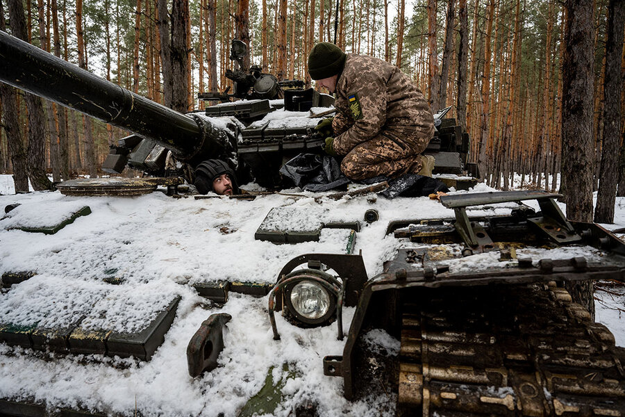 A shell-shocked Ukrainian soldier in a trench is getting taken