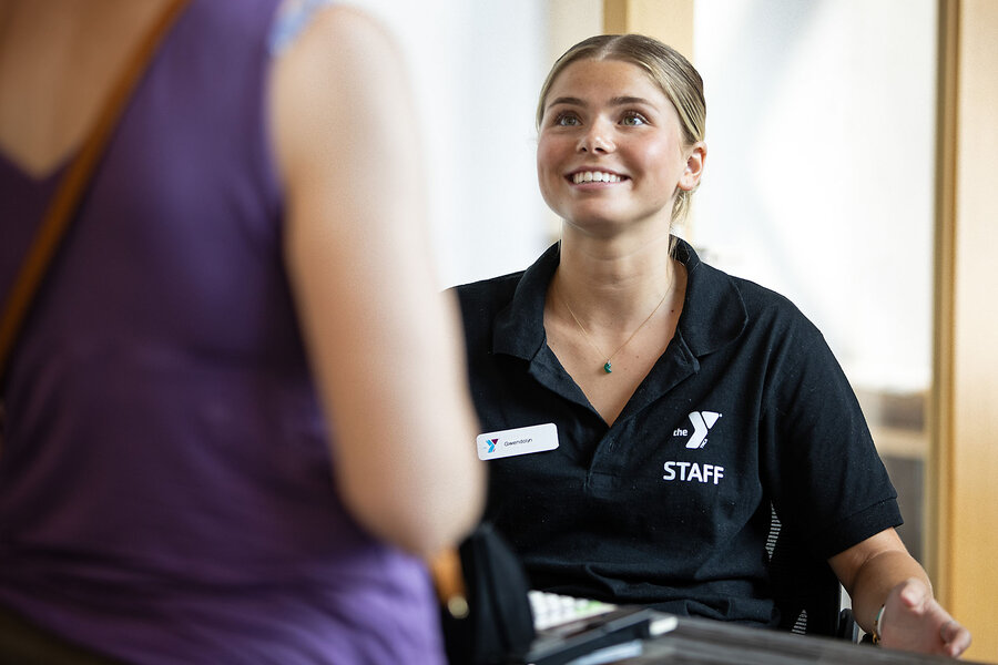 Melanie Stetson Freeman/StaffGwen Duda helps a customer at Parkway Community YMCA as part of a program called Successlink that gives jobs to teens, July 16, 2024, in Boston.