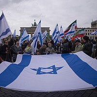 People attend a demonstration in support of Israel on the first anniversary of the Hamas attack on Israel, at the Brandenburg Gate in Berlin, Oct. 6, 2024. 