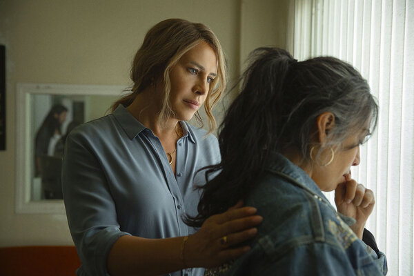 Actresses Karla Sofía Gascón and Adriana Paz stand together in a scene from the movie “Emilia Pérez.”