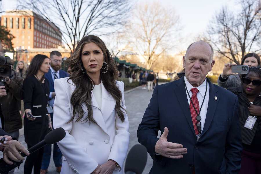 Border czar Tom Homan and Homeland Security Secretary Kristi Noem speak with journalists outside the White House. 