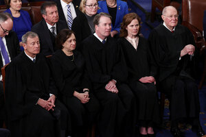 Five U.S. Supreme Court justices stand in a line President Donald Trump's joint address to Congress in Washington on March 4, 2025