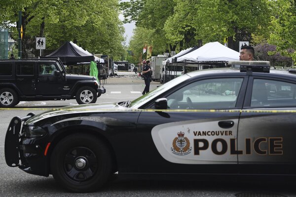 Vancouver Police survey the scene after a driver killed multiple people Saturday during a Filipino community festival, April 27, 2025, in Vancouver, British Columbia.
