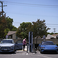 Electric vehicles charge at an Electrify America station in Arcadia, California, in May. The state's outsize role in setting vehicle emissions standards has become a target of the Trump administration and the U.S. Congress. 