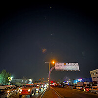 Tracers are seen in the night sky after Iran's armed forces say they targeted a U.S. base in Qatar in a missile attack.
