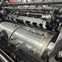 A machine at the National Braille Press runs in Boston, June 18, 2025