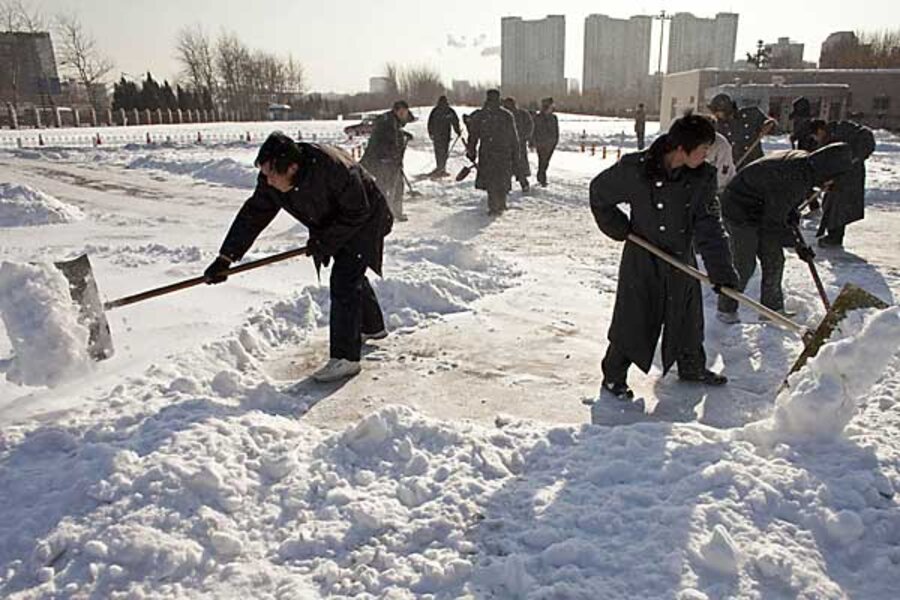 Beijing battles heaviest snowfall in decades with shovels and bamboo ...